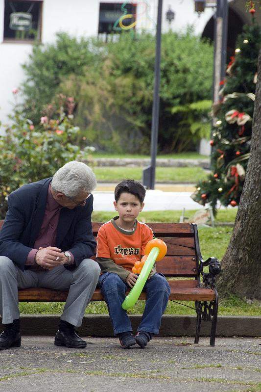 20071219 134514 D2X 2800x4200.jpg - Boy and Dad, Puerto Varas.  Puerto Varas is known for its roses and German traditions and its beautiful scenery